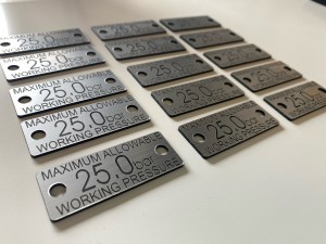 Laser engraved pressue labels